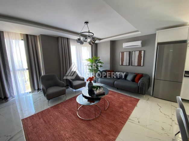 Великолепные апартаменты 3+1 в комплексе с пятизвездочной инфраструктурой развитого района Махмутлар - Ракурс 11