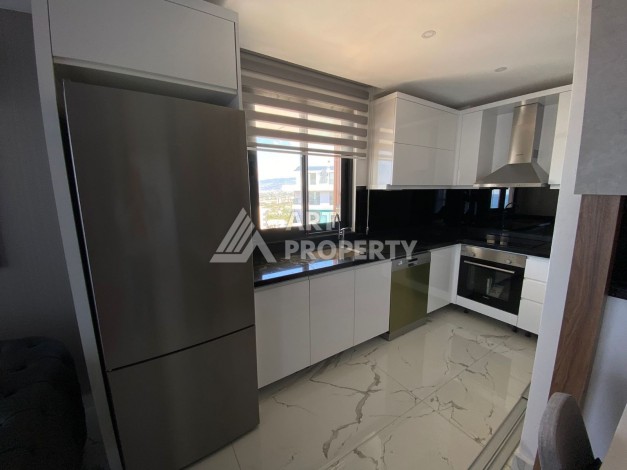 Великолепные апартаменты 3+1 в комплексе с пятизвездочной инфраструктурой развитого района Махмутлар - Ракурс 13