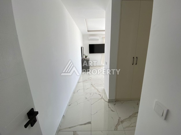 Великолепные апартаменты 3+1 в комплексе с пятизвездочной инфраструктурой развитого района Махмутлар - Ракурс 17