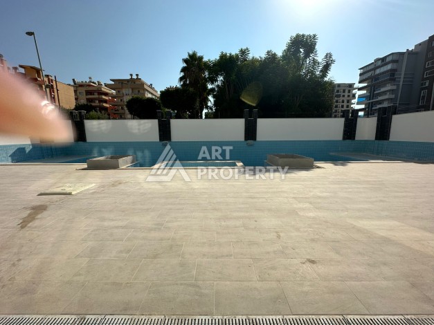 Квартира 1+1 в новостройке в самом центре Махмутлара! - Ракурс 3