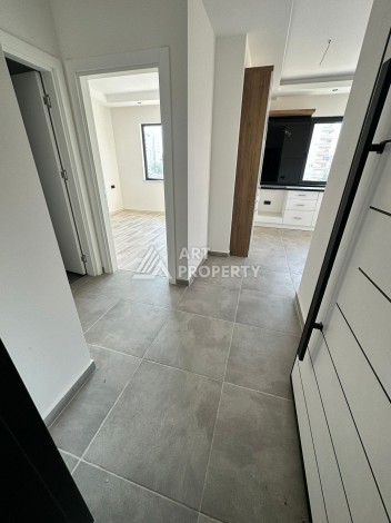 Квартира 1+1 в новостройке в самом центре Махмутлара! - Ракурс 11