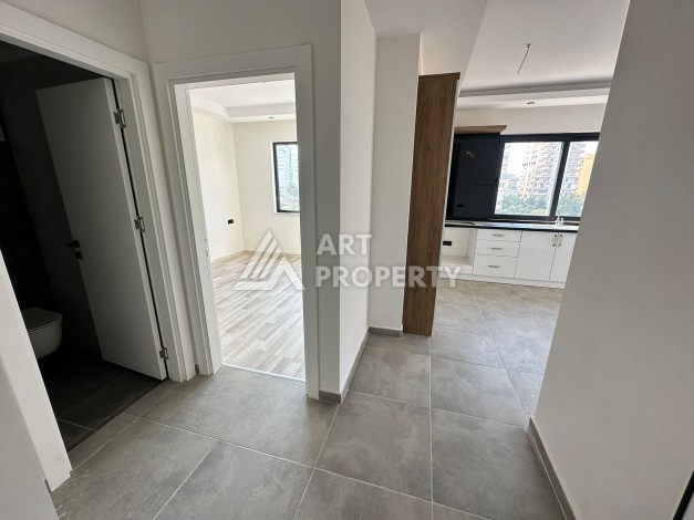 Квартира 1+1 в новостройке в самом центре Махмутлара! - Ракурс 12