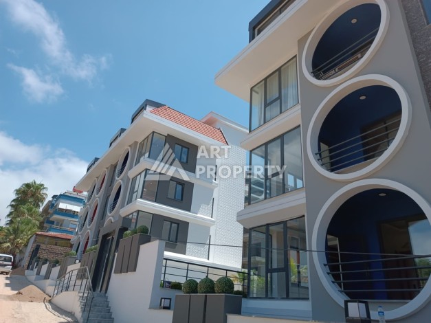 Апартаменты 1+1 с своим садом в новом комплексе развитого района Махмутлар - Ракурс 3