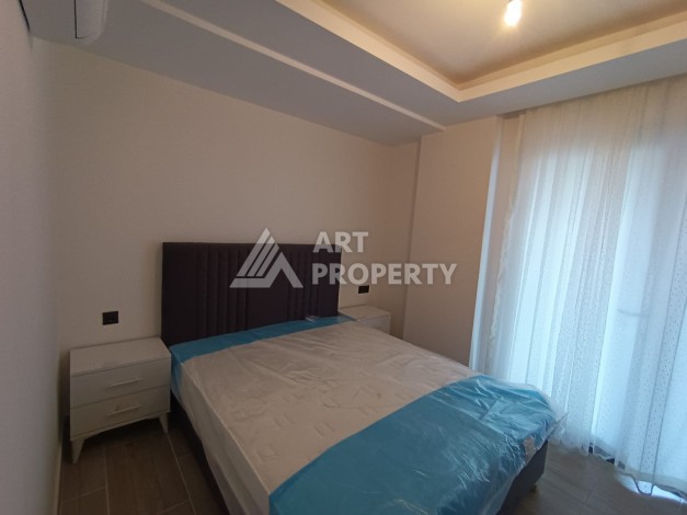 Апартаменты 1+1 с своим садом в новом комплексе развитого района Махмутлар - Ракурс 4