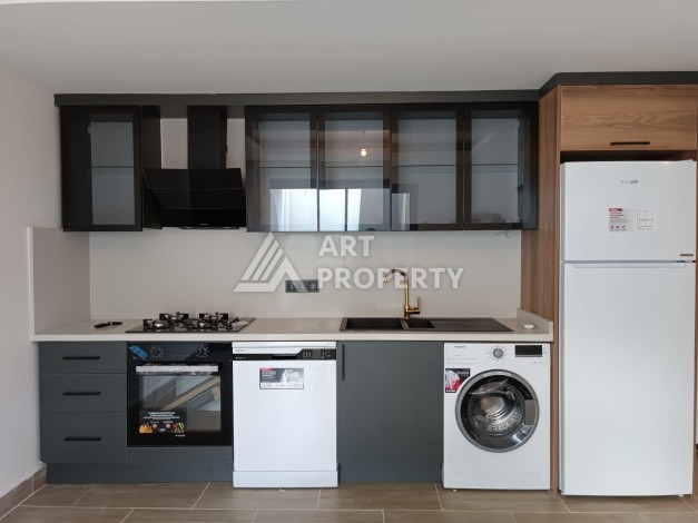 Апартаменты 1+1 с своим садом в новом комплексе развитого района Махмутлар - Ракурс 6