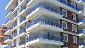 Апартаменты 1+1 рядом с морем в развитом районе Махмутлар - Ракурс 1