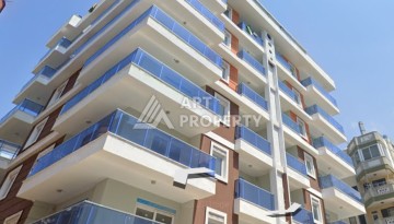 Апартаменты 1+1 рядом с морем в развитом районе Махмутлар - Ракурс 6
