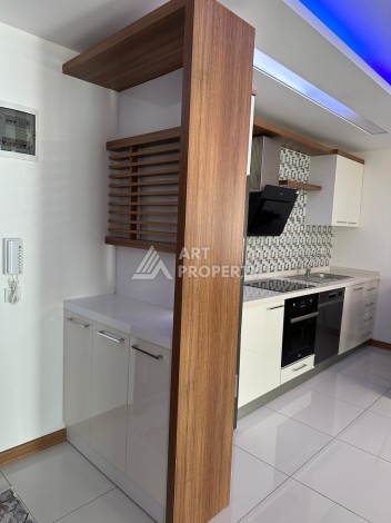 Апартаменты 1+1 с дизайнерским ремонтом и мебелью в качественном комплексе развитого района Махмутлар - Ракурс 5