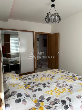 Апартаменты 1+1 с дизайнерским ремонтом и мебелью в качественном комплексе развитого района Махмутлар - Ракурс 10