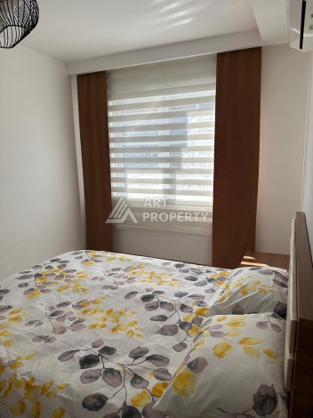 Апартаменты 1+1 с дизайнерским ремонтом и мебелью в качественном комплексе развитого района Махмутлар - Ракурс 11