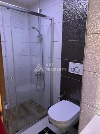 Апартаменты 1+1 с дизайнерским ремонтом и мебелью в качественном комплексе развитого района Махмутлар - Ракурс 15