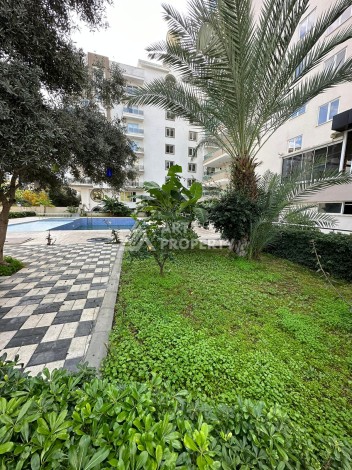 Апартаменты 1+1 с дизайнерским ремонтом и мебелью в качественном комплексе развитого района Махмутлар - Ракурс 17