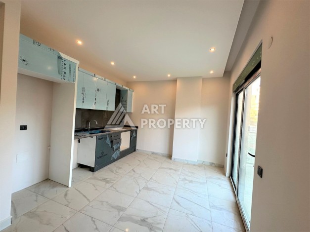 Новые апартаменты 1+1 в комплексе класса люкс в самом развитом районе Алании Оба - Ракурс 2