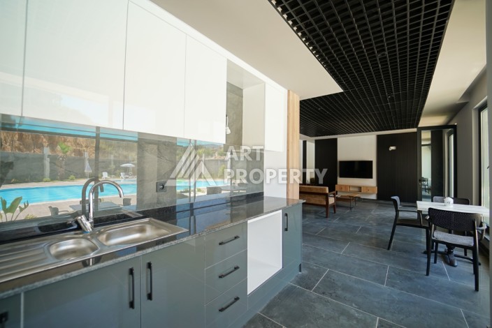 Новые апартаменты 1+1 в комплексе класса люкс в самом развитом районе Алании Оба - Ракурс 11