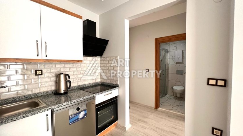 Квартира 1+1 в Махмутларе вблизи моря! - Ракурс 8