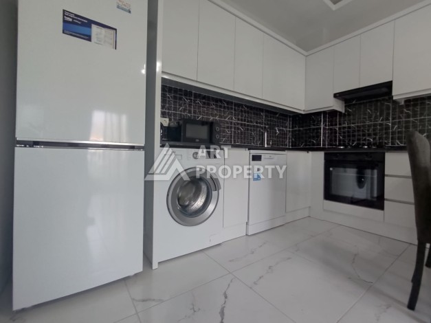 1+1 на 5м этаже в новом комплекске, 55 м.кв. 250м от моря в Махмутларе - Ракурс 3