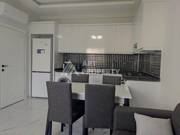 1+1 на 5м этаже в новом комплекске, 55 м.кв. 250м от моря в Махмутларе - Ракурс 4