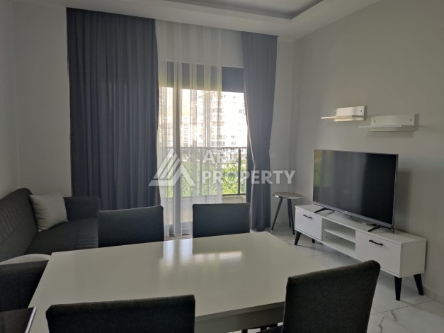 1+1 на 5м этаже в новом комплекске, 55 м.кв. 250м от моря в Махмутларе - Ракурс 5