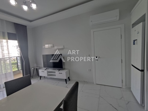 1+1 на 5м этаже в новом комплекске, 55 м.кв. 250м от моря в Махмутларе - Ракурс 7