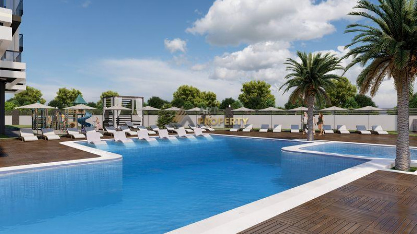 Инвестиционный проект на стадии строительства. Квартиры 1+1, 2+1 и 3+1 пентхаусы по стартовым ценам! Авсаллар, Алания. - Ракурс 4