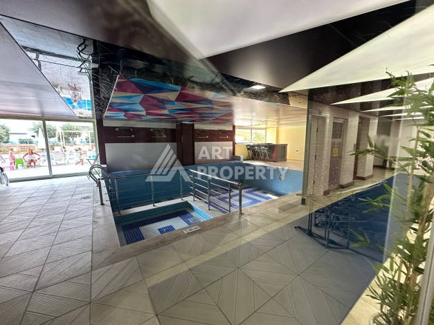 Просторная 1+1 с большой планировкой в комплексе бизнес класса в развитом районе Махмутлар - Ракурс 18