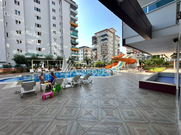 Просторная 1+1 с большой планировкой в комплексе бизнес класса в развитом районе Махмутлар - Ракурс 27