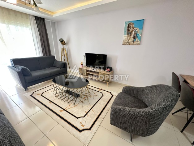 Просторная 1+1 с большой планировкой в комплексе бизнес класса в развитом районе Махмутлар - Ракурс 30