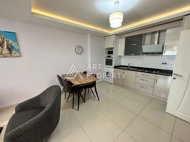 Просторная 1+1 с большой планировкой в комплексе бизнес класса в развитом районе Махмутлар - Ракурс 31