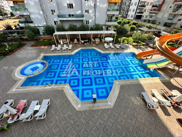 Просторная 1+1 с большой планировкой в комплексе бизнес класса в развитом районе Махмутлар - Ракурс 47