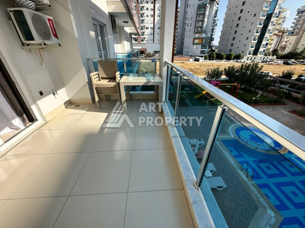 Просторная 1+1 с большой планировкой в комплексе бизнес класса в развитом районе Махмутлар - Ракурс 49