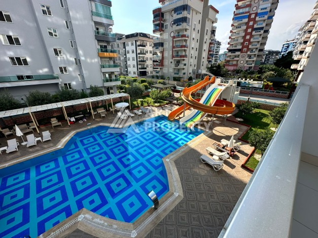 Просторная 1+1 с большой планировкой в комплексе бизнес класса в развитом районе Махмутлар - Ракурс 50