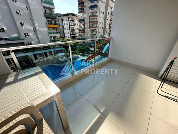 Просторная 1+1 с большой планировкой в комплексе бизнес класса в развитом районе Махмутлар - Ракурс 51