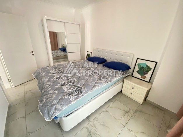 Колоритные апартаменты 1+1 в турецком комплексе в развитом районе Махмутлар - Ракурс 2