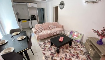 Колоритные апартаменты 1+1 в турецком комплексе в развитом районе Махмутлар - Ракурс 4