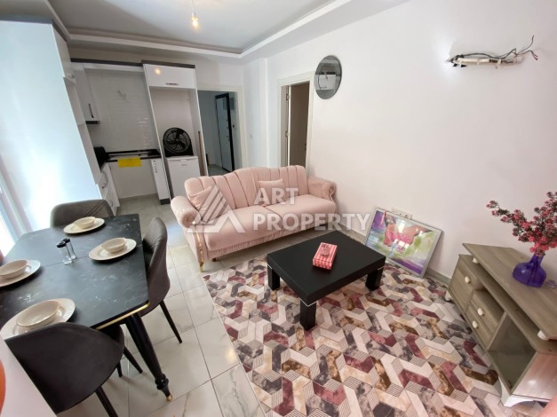 Колоритные апартаменты 1+1 в турецком комплексе в развитом районе Махмутлар - Ракурс 3