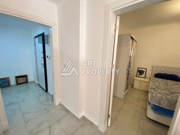 Колоритные апартаменты 1+1 в турецком комплексе в развитом районе Махмутлар - Ракурс 4