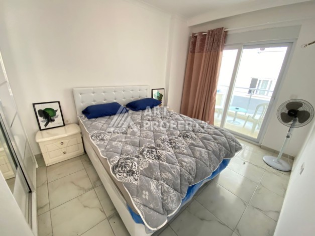 Колоритные апартаменты 1+1 в турецком комплексе в развитом районе Махмутлар - Ракурс 5