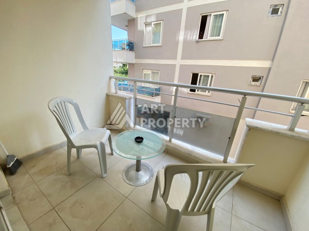 Колоритные апартаменты 1+1 в турецком комплексе в развитом районе Махмутлар - Ракурс 8