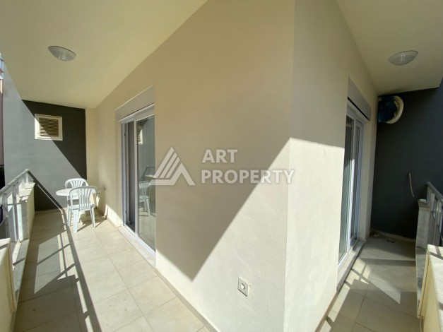 Колоритные апартаменты 1+1 в турецком комплексе в развитом районе Махмутлар - Ракурс 9