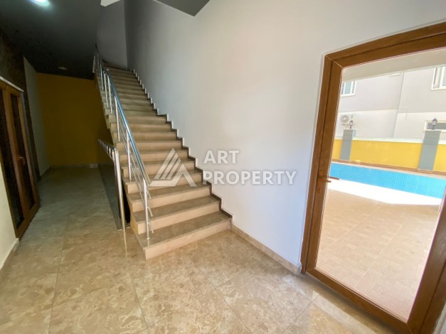 Колоритные апартаменты 1+1 в турецком комплексе в развитом районе Махмутлар - Ракурс 10