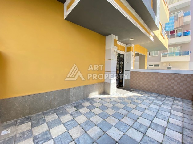 Колоритные апартаменты 1+1 в турецком комплексе в развитом районе Махмутлар - Ракурс 13