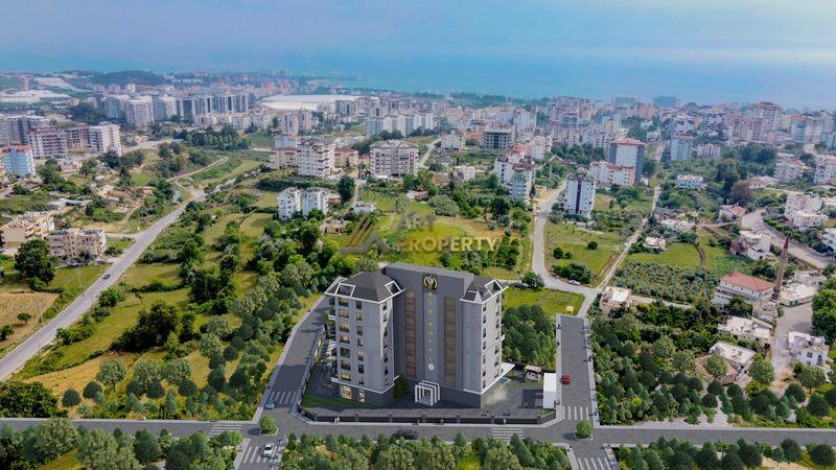 Инвестиционный проект на стадии строительства. Квартиры 1+1, 2+1 и 3+1 пентхаусы по стартовым ценам! Авсаллар, Алания. - Ракурс 21