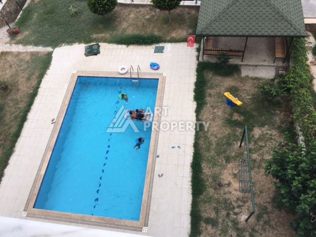 Видовые апартаменты 2+1 в развитом районе Махмутлар - Ракурс 15