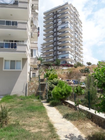 Видовые апартаменты 2+1 в развитом районе Махмутлар - Ракурс 16