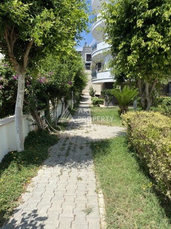 Меблированные апартаменты 2+1 в развитом районе Махмутлар - Ракурс 15