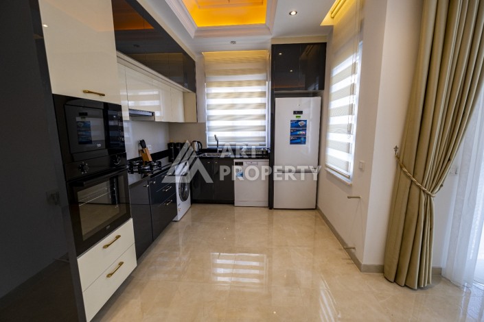 Стильные апартаменты 2+1 в премиальном комплексе самого развитого района Махмутлар - Ракурс 10