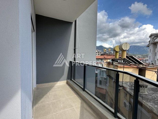 Новые апартаменты 2+1 в уютном комплексе самого развитого района Оба - Ракурс 10