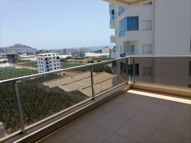 Двухуровневый четырехкомнатный пентхаус с видом на море и горы, район Махмутлар, 200 м2 - Ракурс 10