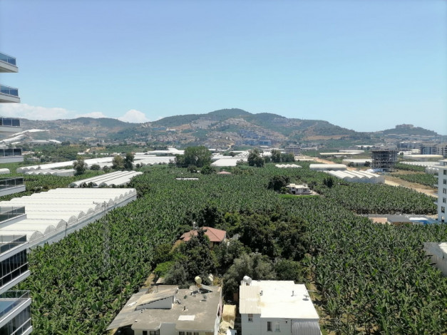 Двухуровневый четырехкомнатный пентхаус с видом на море и горы, район Махмутлар, 200 м2 - Ракурс 15