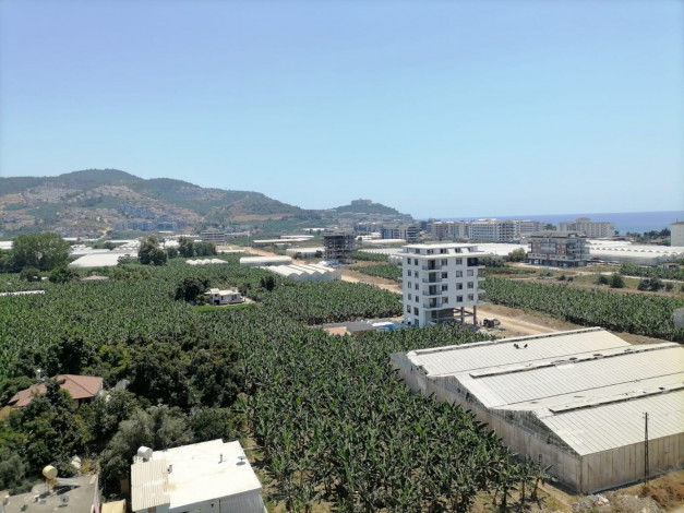 Двухуровневый четырехкомнатный пентхаус с видом на море и горы, район Махмутлар, 200 м2 - Ракурс 18